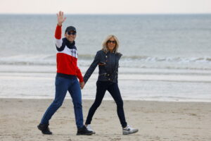 French President Emmanuel Macron, candidate for his re-election, walks in Le Touquet-Paris-Plage