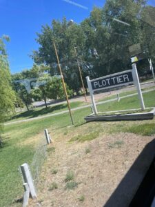 Cartel_de_la_ciudad_de_Plottier